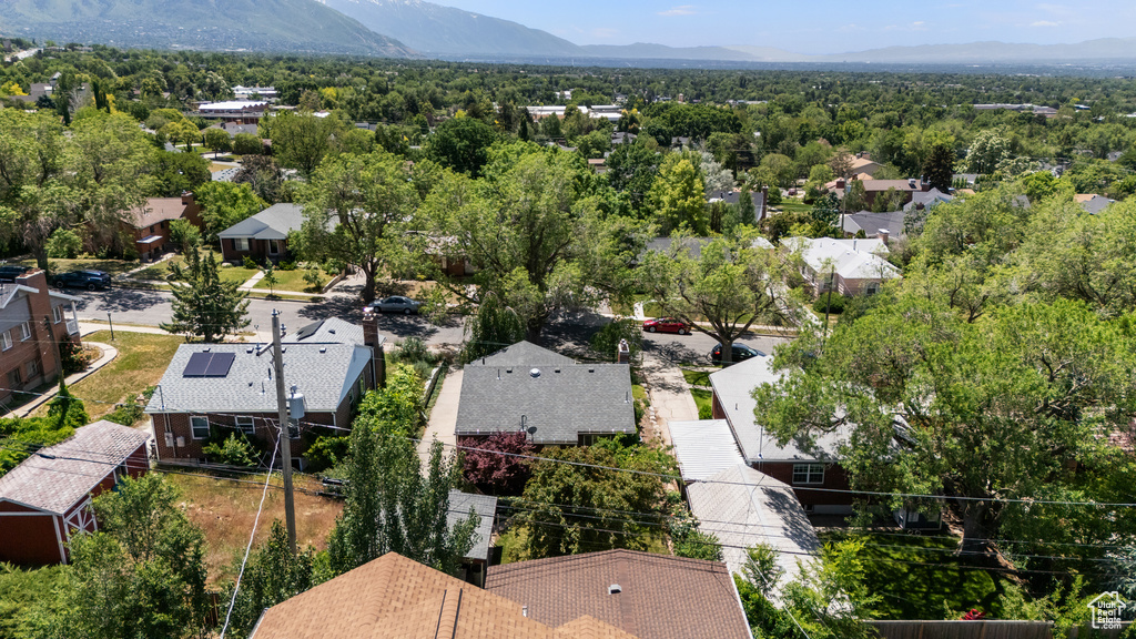 Aerial view of residential area with a mountain backdrop