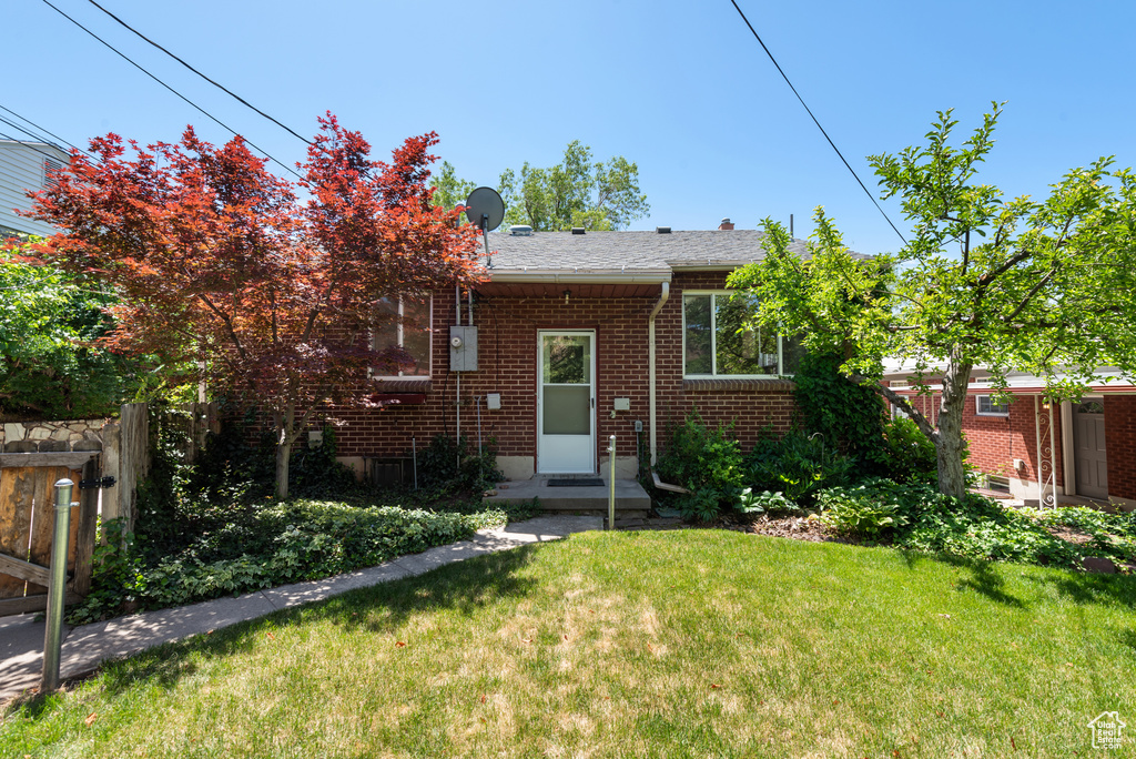 View of front of home with brick siding