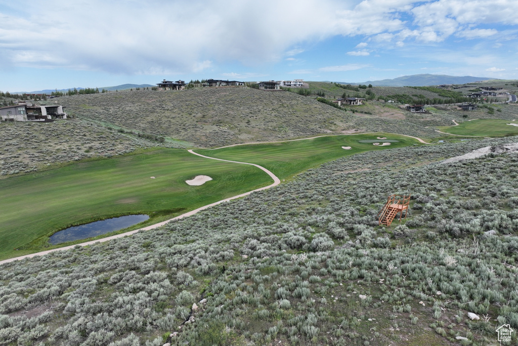 View of mountain backdrop with a golf club