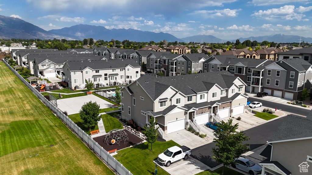 Aerial view of residential area featuring mountains