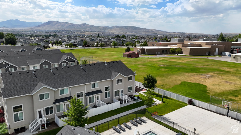 Aerial view of residential area with mountains
