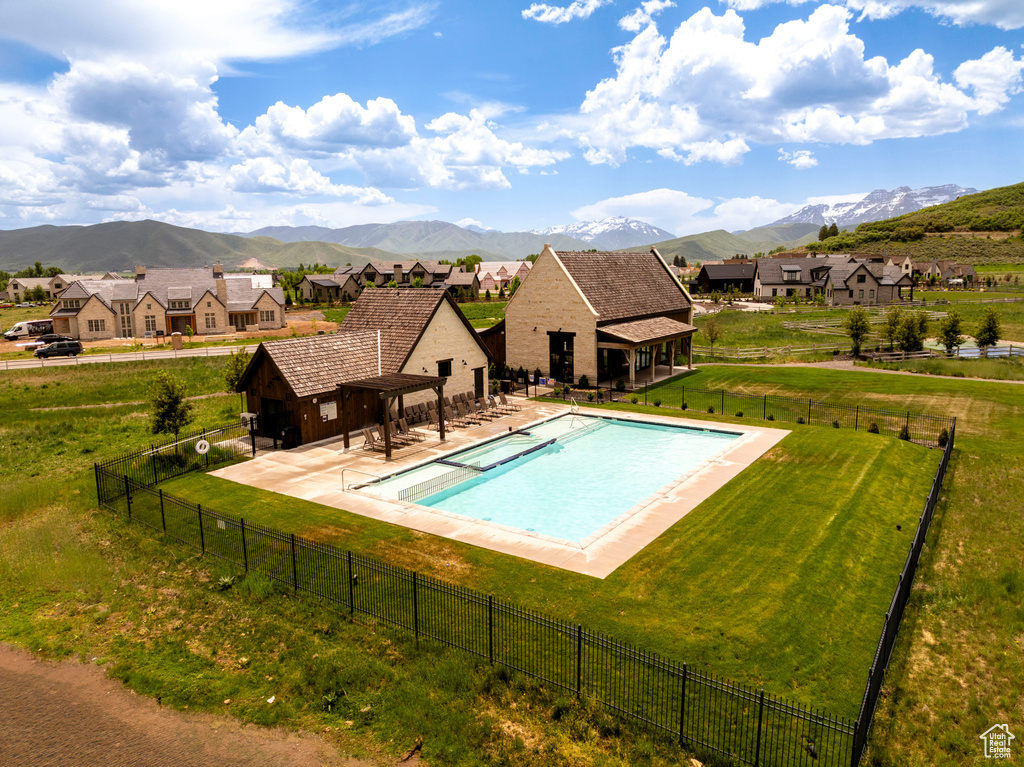 View of swimming pool featuring a mountain view and a residential view