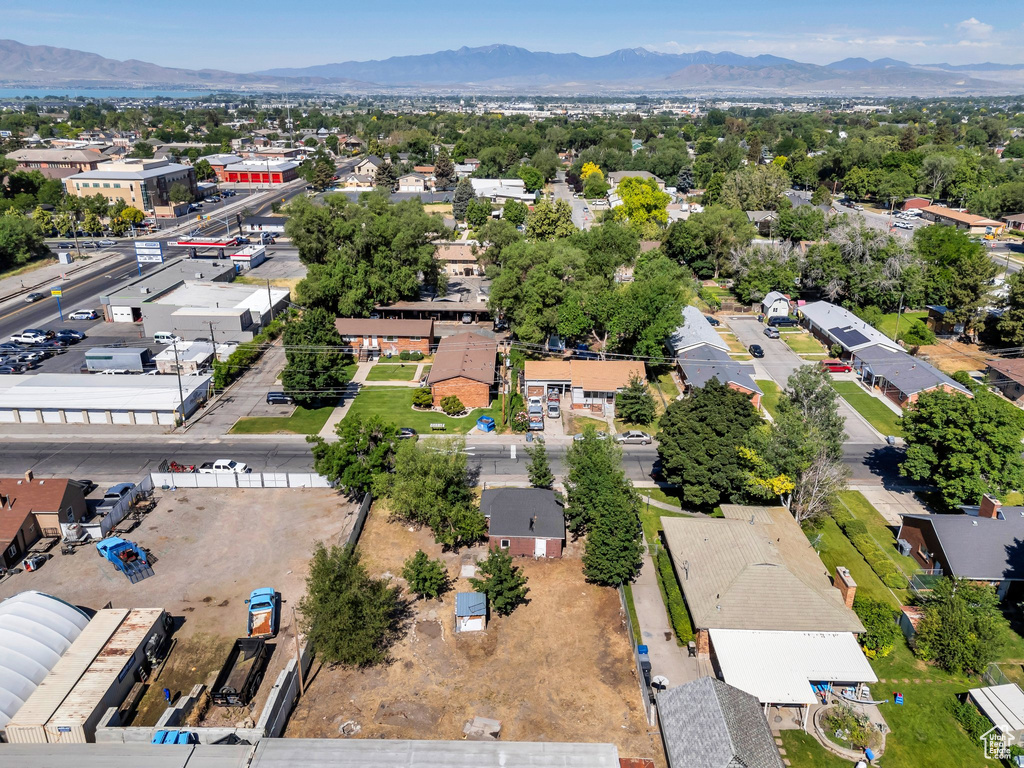 Aerial perspective of suburban area featuring a mountainous background