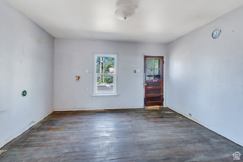 Spare room with wood finished floors