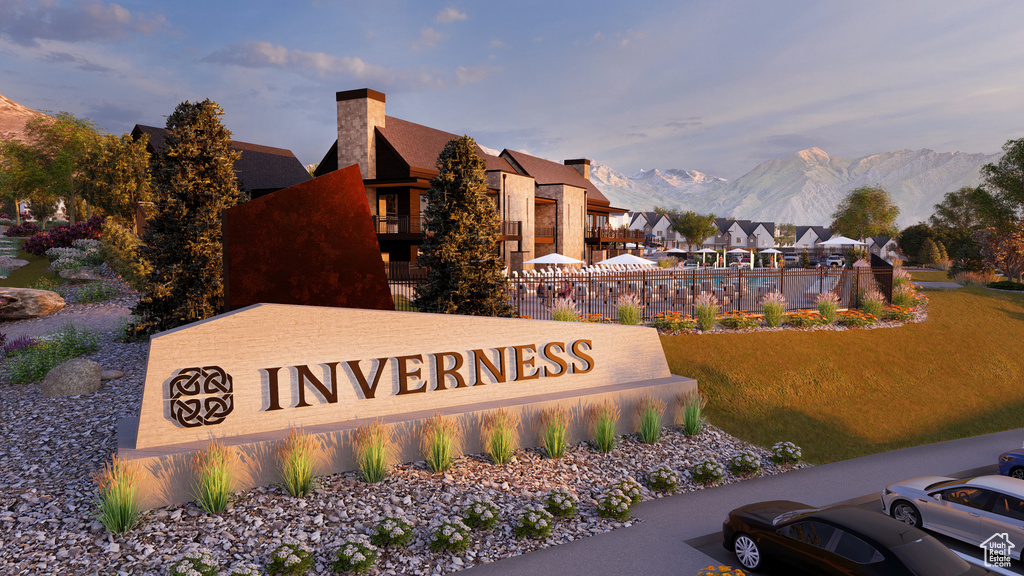 Community / neighborhood sign featuring a mountain view and a residential view