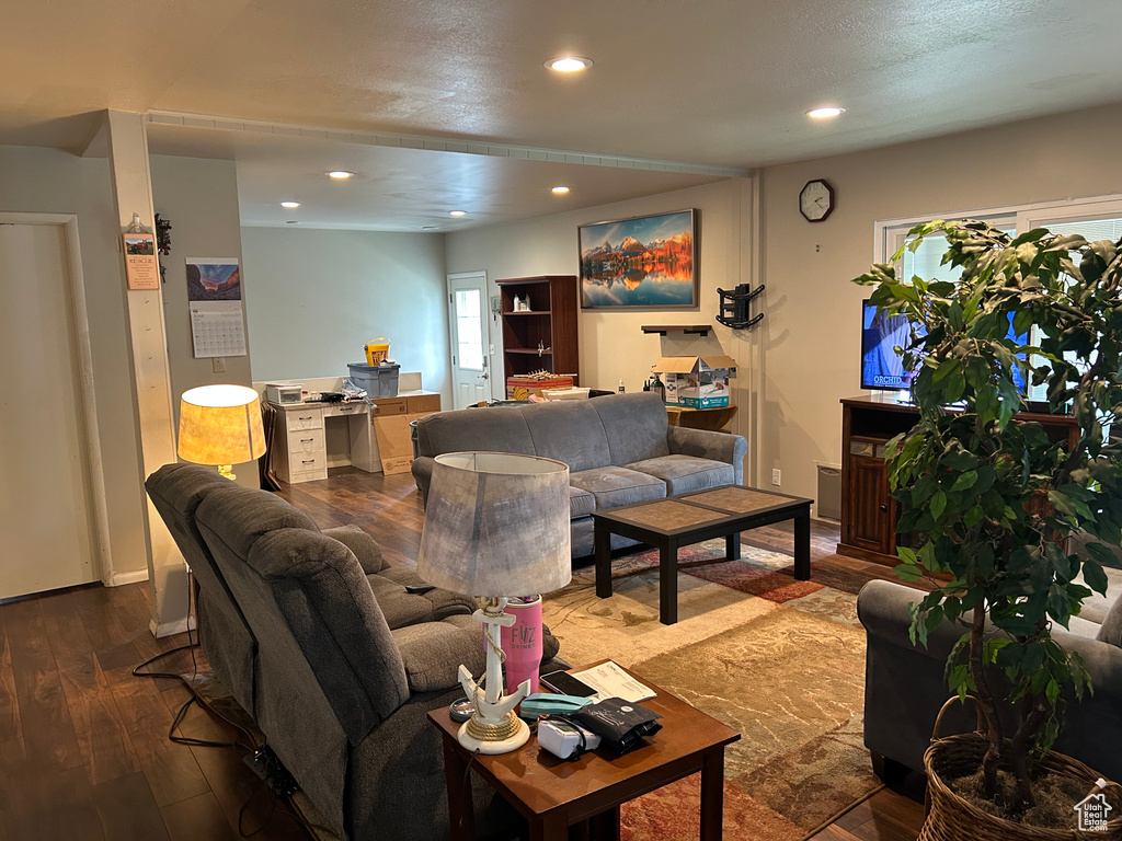 Living room featuring recessed lighting and wood finished floors