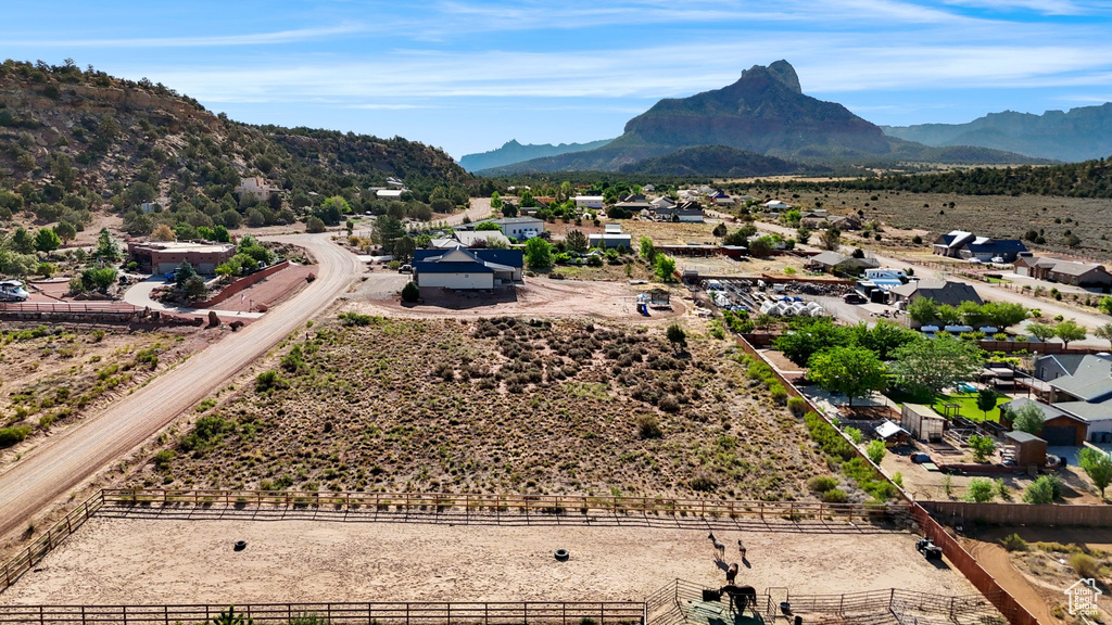 Aerial perspective of suburban area featuring a mountain backdrop