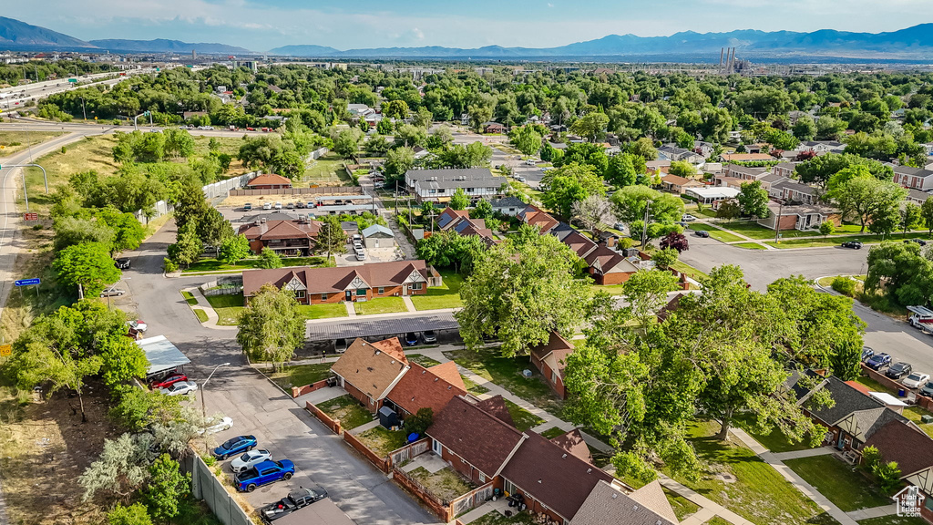 Aerial view of residential area with a mountain backdrop