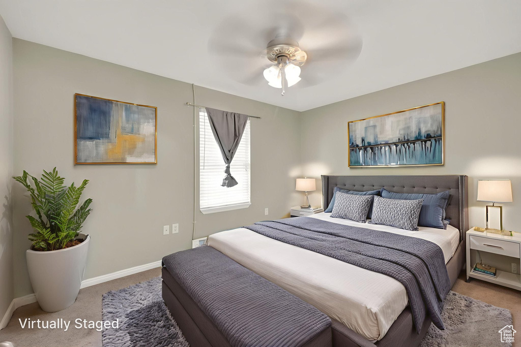 Bedroom featuring carpet floors and a ceiling fan