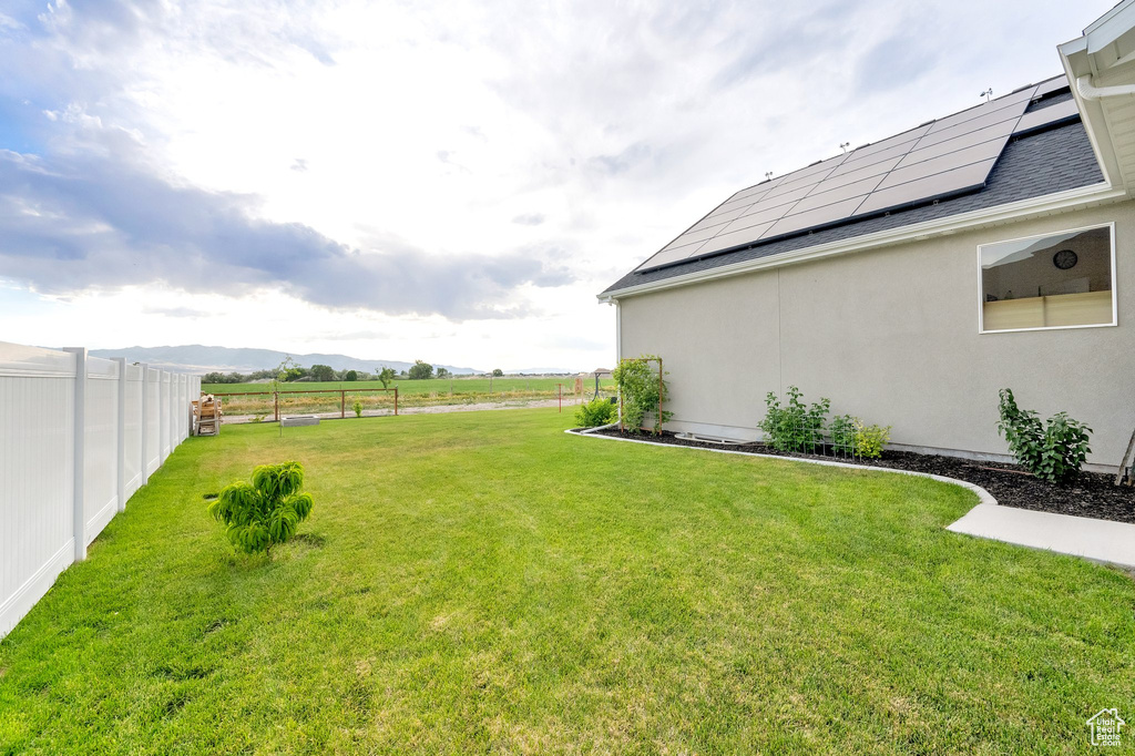 View of yard with a mountain view