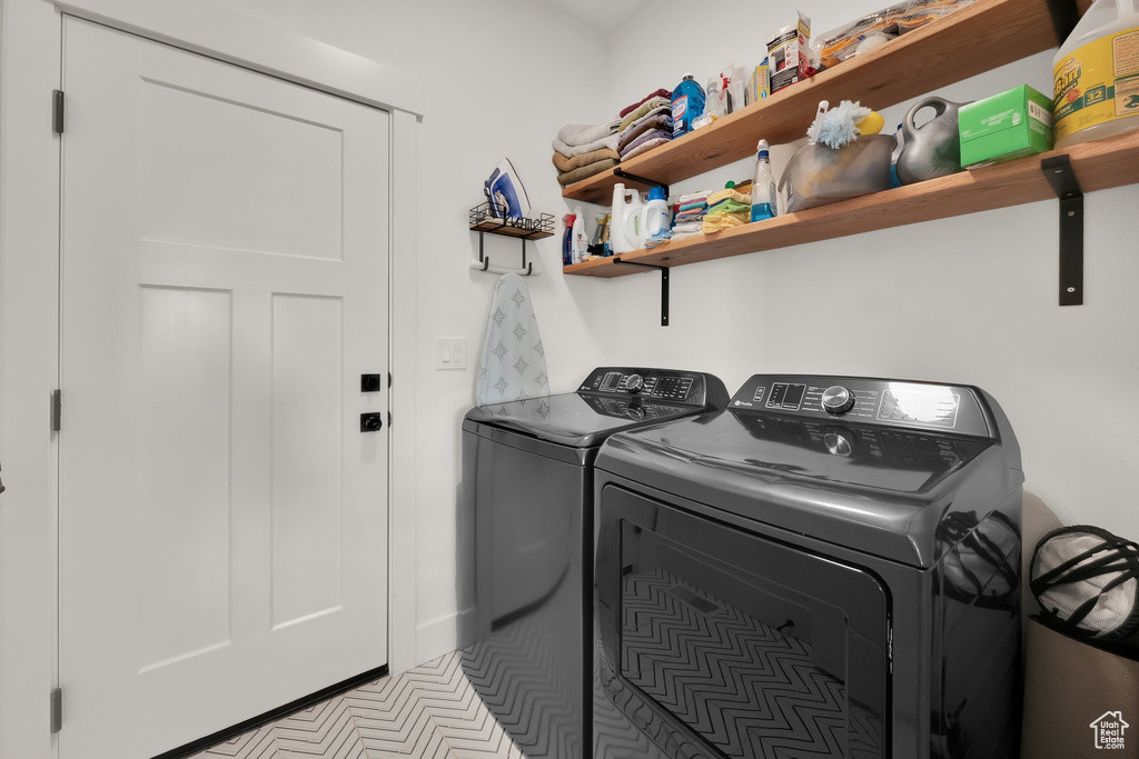 Washroom featuring separate washer and dryer
