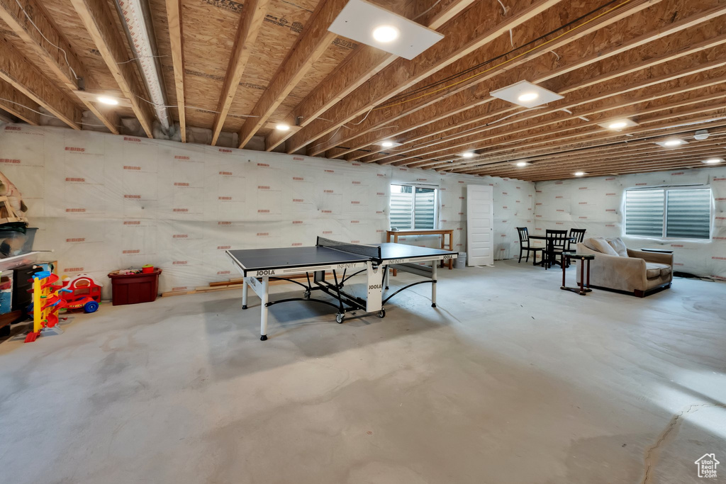 Playroom with concrete flooring