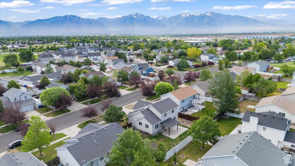 Aerial view of residential area with a mountain backdrop