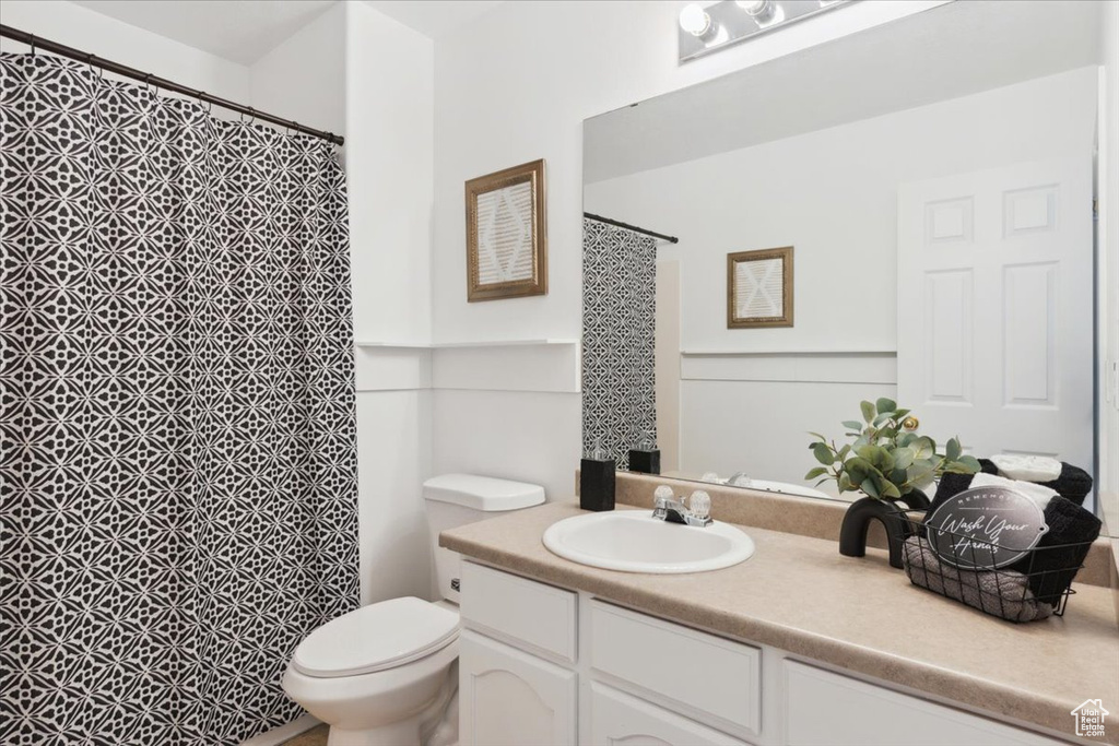 Bathroom with vanity and a shower with curtain