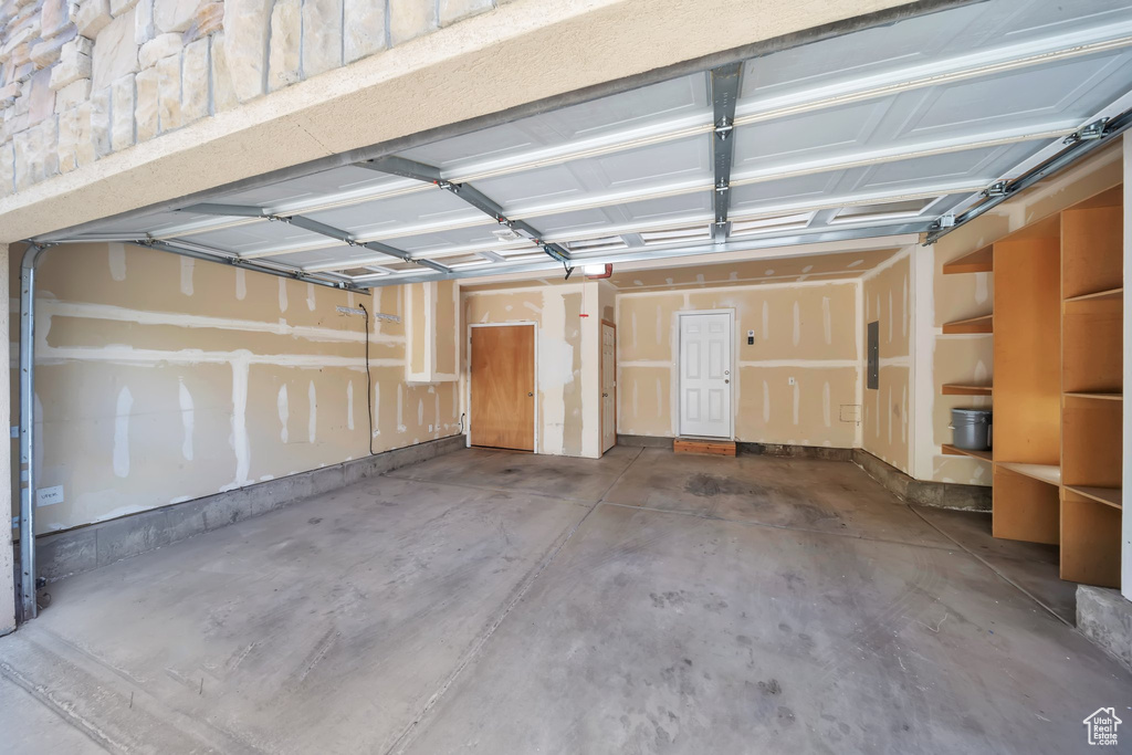 Garage featuring electric panel