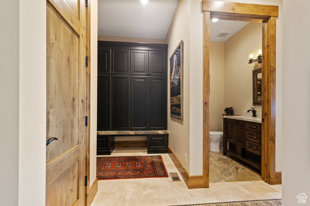 Entrance foyer featuring baseboards