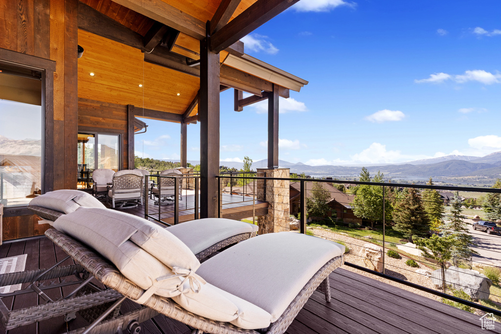 Wooden deck featuring a mountain view