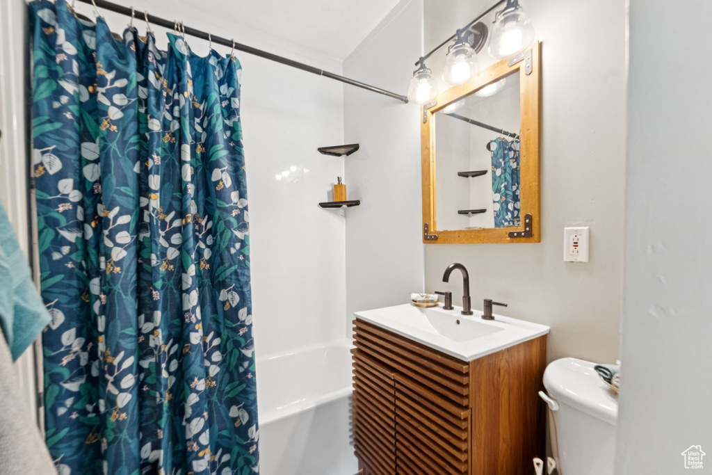 Full bathroom featuring vanity and shower / bath combo