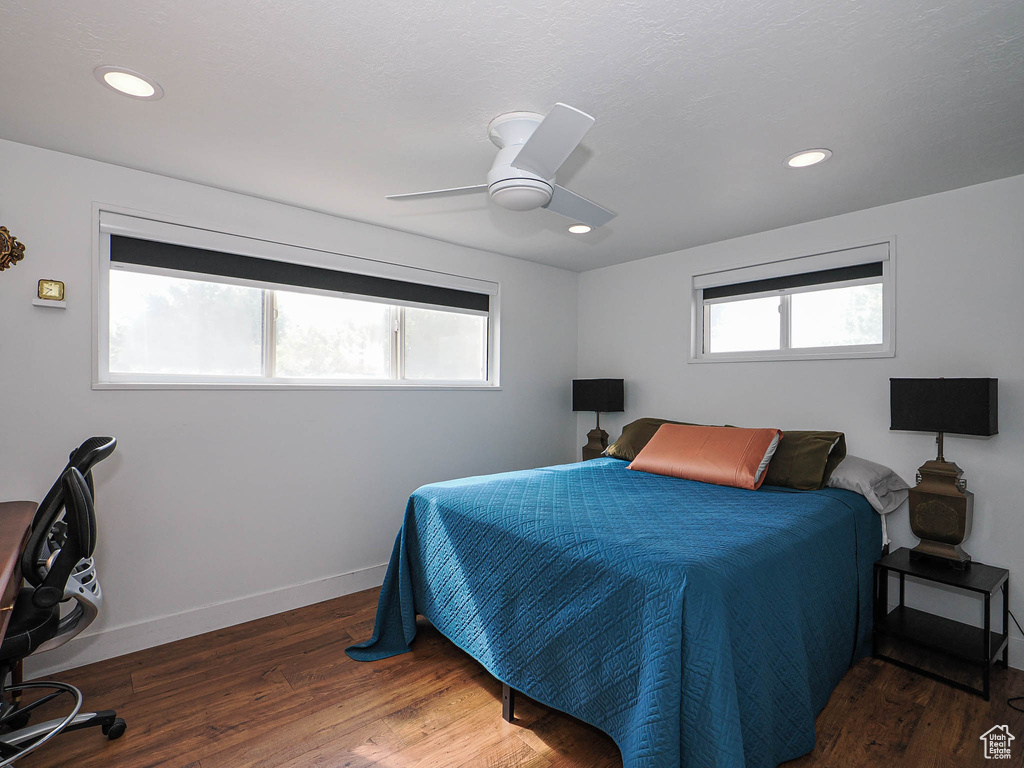 Bedroom with wood finished floors, recessed lighting, and ceiling fan