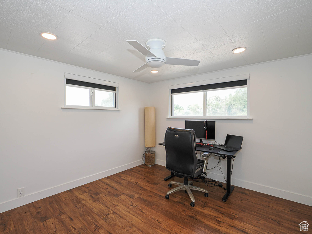 Office space with wood finished floors, a ceiling fan, and recessed lighting