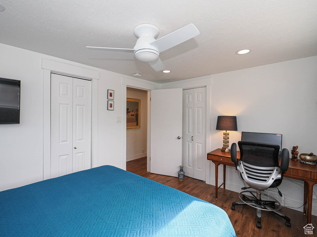 Bedroom with wood finished floors, ceiling fan, recessed lighting, and a desk