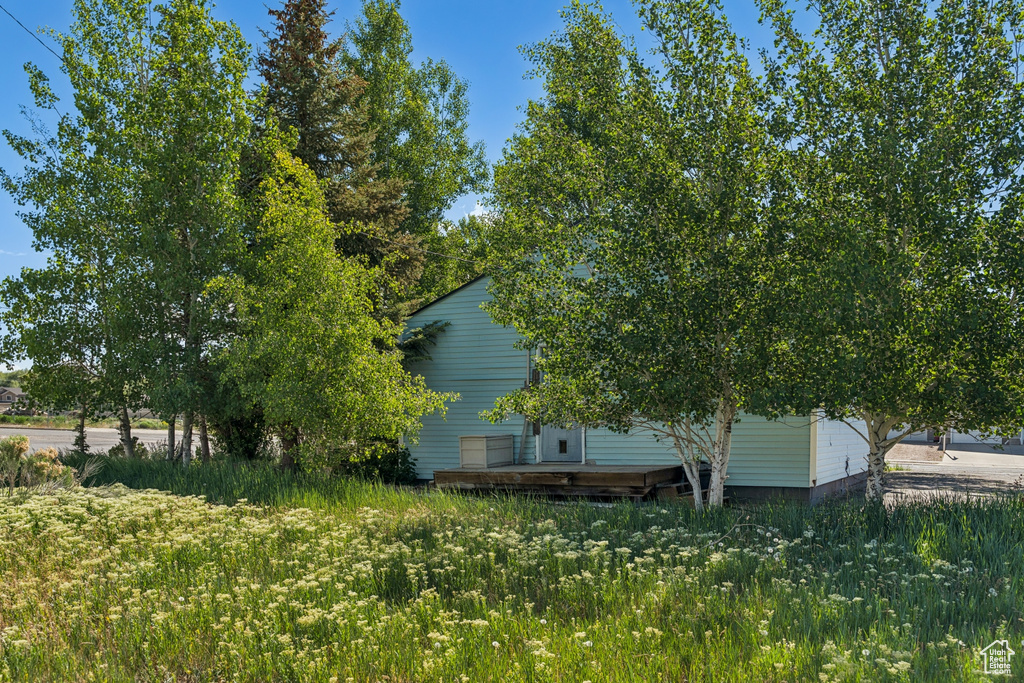 View of property exterior with a deck