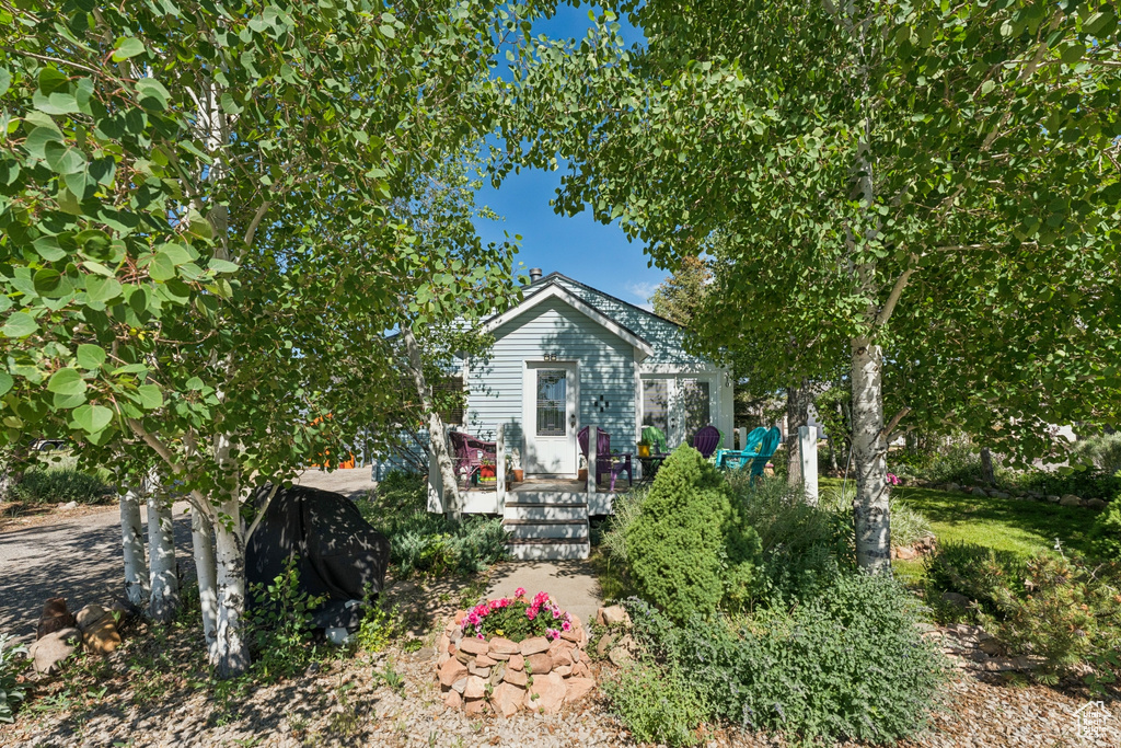Rear view of property with a deck