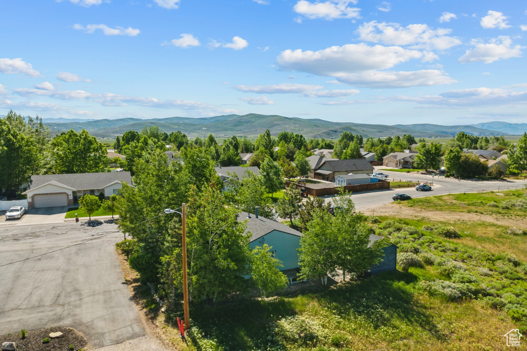 Aerial view of residential area with a mountain backdrop