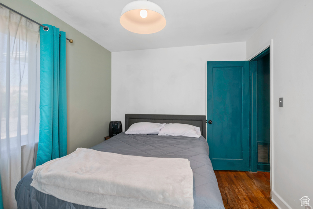 Bedroom featuring wood finished floors