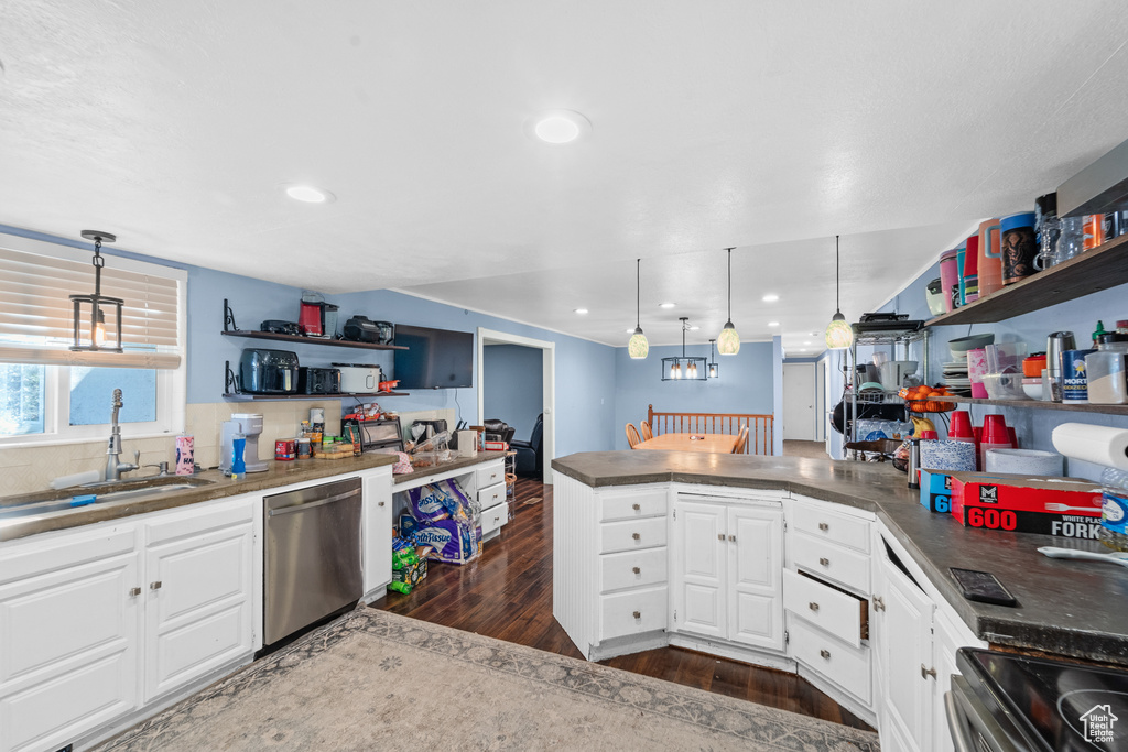 Kitchen featuring dishwasher, open shelves, dark wood-style floors, white cabinets, and recessed lighting
