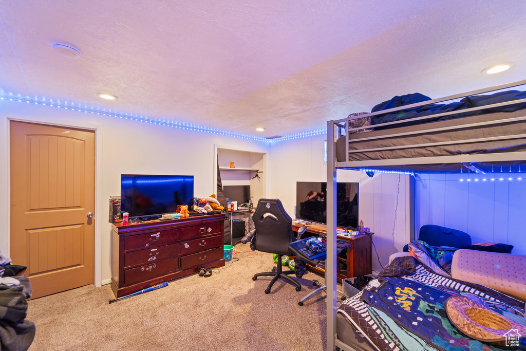 Bedroom featuring carpet and recessed lighting