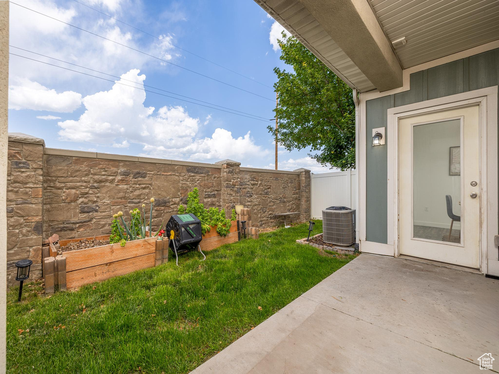 View of yard with a patio area