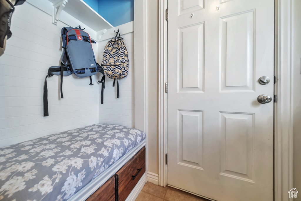 Mudroom featuring light tile patterned flooring