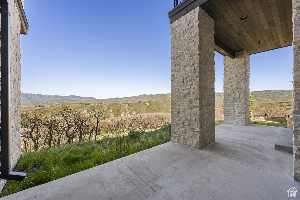 View of patio / terrace featuring a mountain view