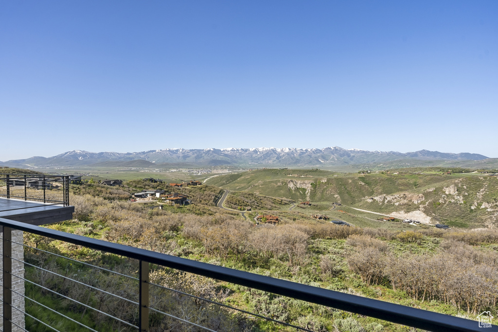 View of mountain backdrop featuring rural landscape