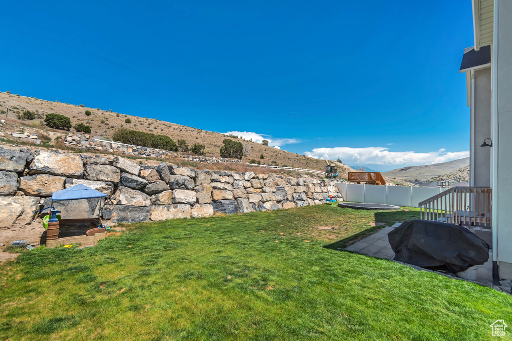 View of yard featuring a mountain view