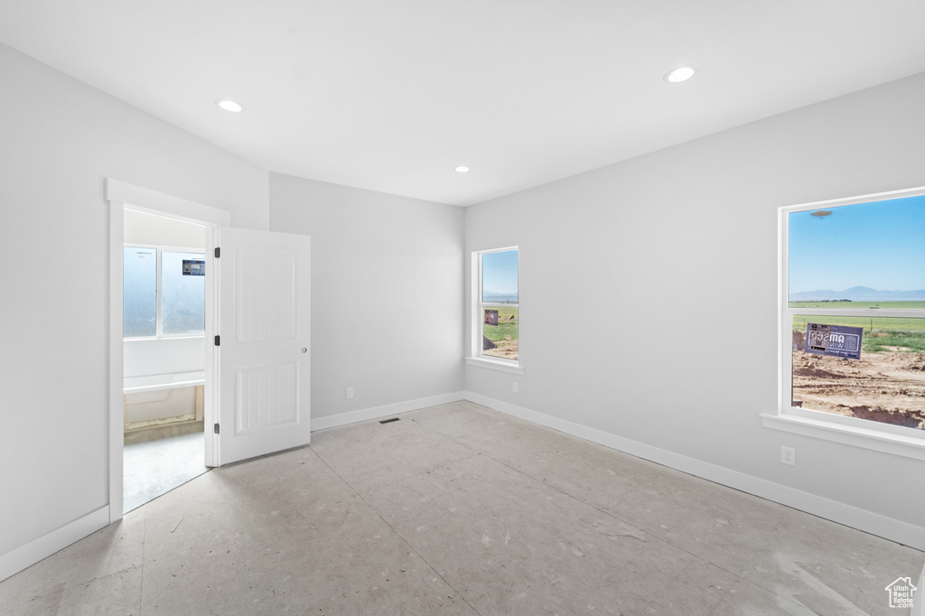 Empty room featuring recessed lighting
