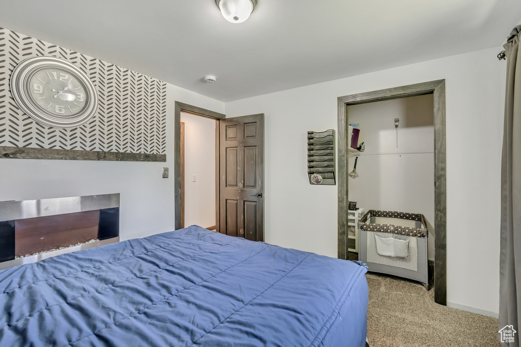 Bedroom featuring carpet flooring