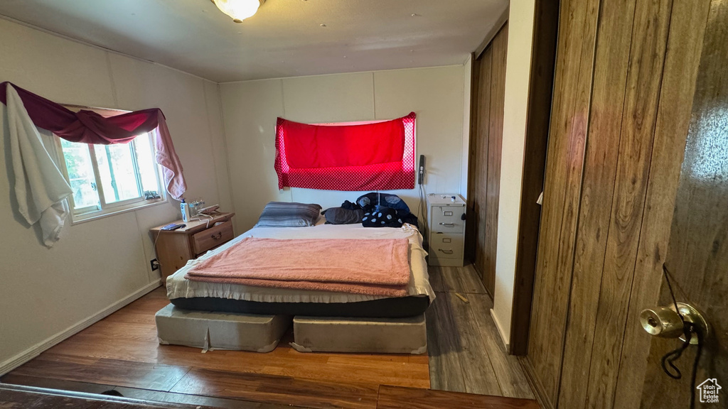 Bedroom featuring wood finished floors