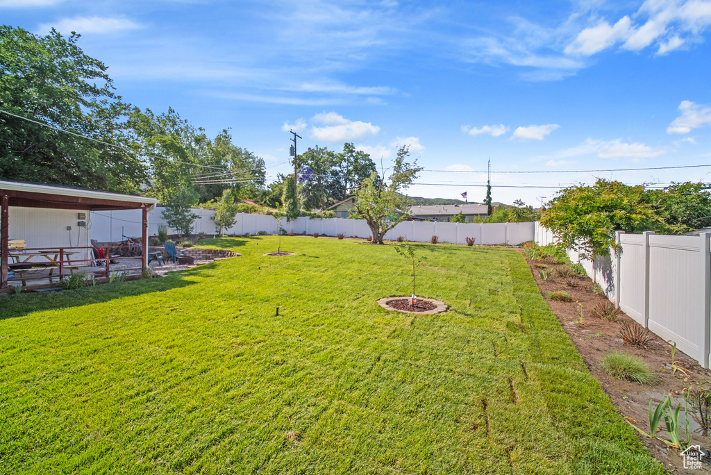 View of yard with a patio