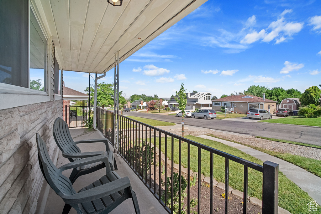Porch featuring a residential view