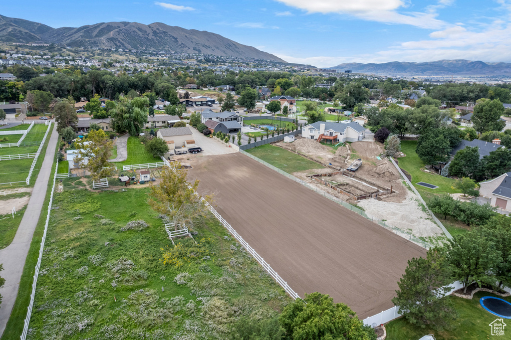 Aerial view of property's location featuring nearby suburban area
