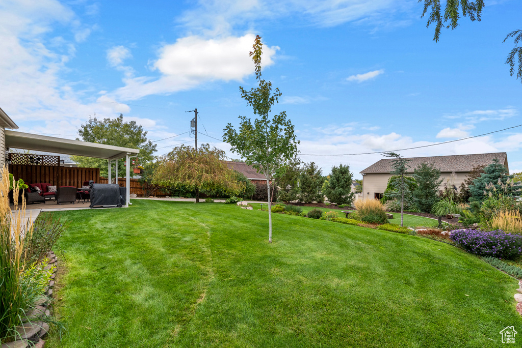 View of yard featuring outdoor lounge area and a patio area