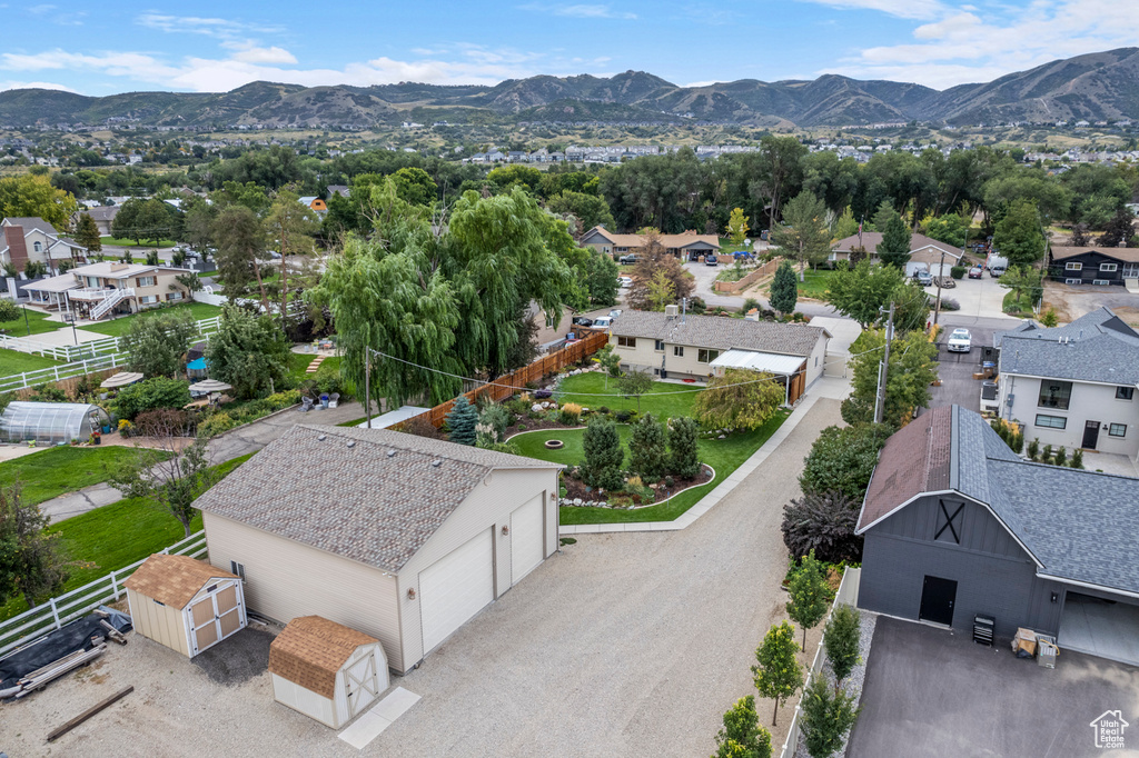 Aerial view of residential area featuring mountains