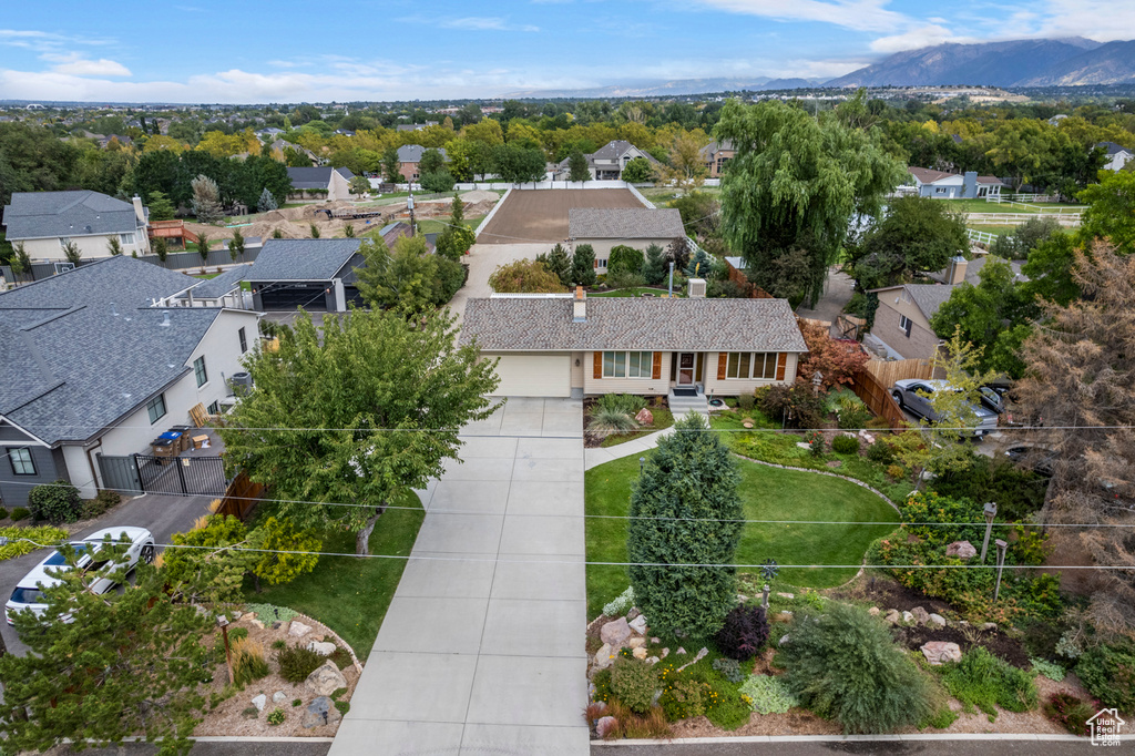 Aerial view of residential area with a mountainous background
