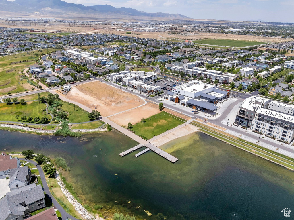 View of property location featuring a water and mountain view