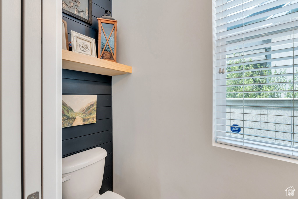 Half bathroom featuring toilet