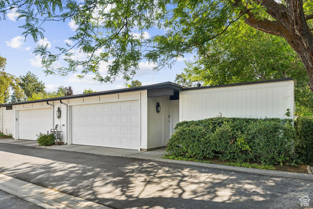 View of front of property featuring a garage