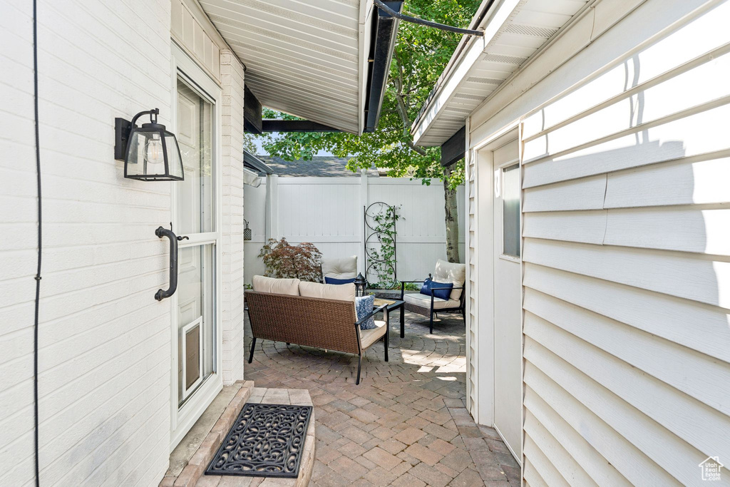 View of patio featuring an outdoor hangout area