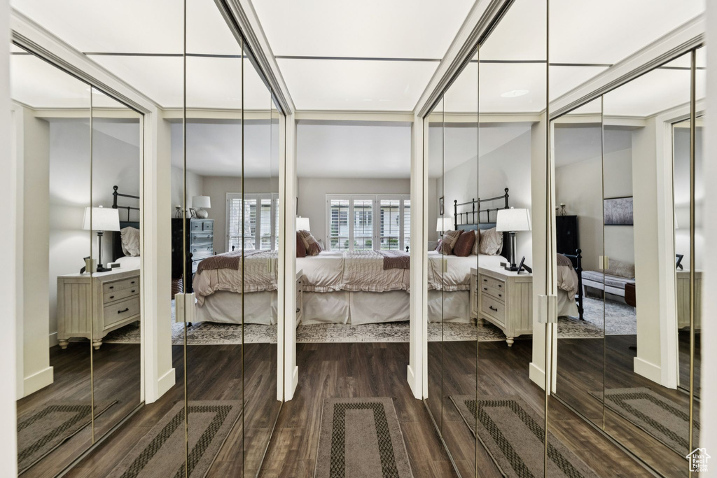 Bedroom featuring wood finished floors and french doors